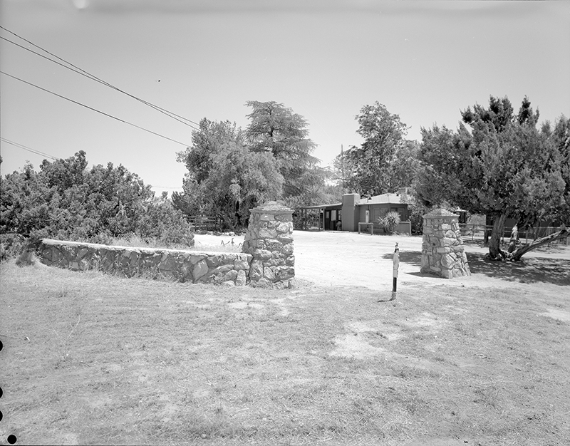 Stone pillars and wall located northwest of Ranger's Residence, view facing southeast.